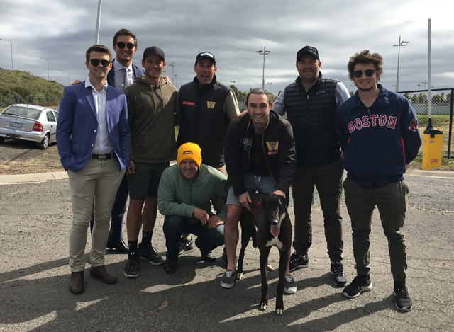 Nippers with eight of the 51 Bees On Fire Werribee Football Club Syndicate members after a trial at Geelong